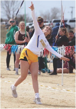 EMMIE FISHELL, a Scobey freshman, lets the javelin fly during the season-opening Glasgow Invitational