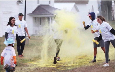 SPLASH! A runner makes her ….