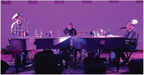 DUELING PIANOS entertained a crowd ….