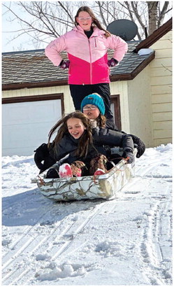 THE SCOBEY SCHOOL sledding party.