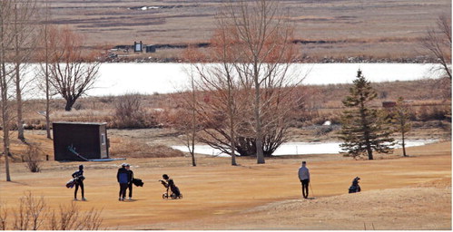 WHILE DRIVING AROUND SCOBEY the ….