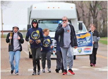 THE SPECIAL OLYMPICS TORCH RUN ….