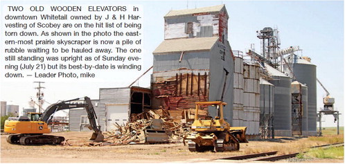 TWO OLD WOODEN ELEVATORS in ….
