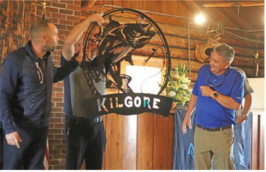 MIKE KILGORE (right) checks out ….