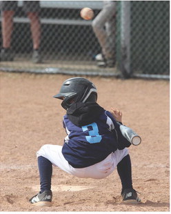 ISAAC MAY ducks a pitch ….
