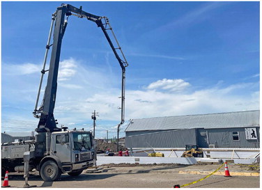 CEMENT PUMP TRUCK—A concrete pump ….